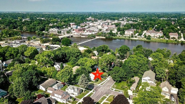 128 Howard Street Geneva, IL 60134 - Photo 24 of 29 an aerial view of residential houses with outdoor space and river