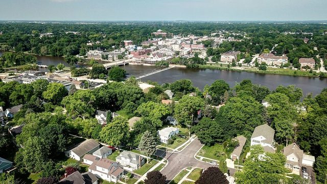 128 Howard Street Geneva, IL 60134 - Photo 26 of 29 an aerial view of residential houses with outdoor space and trees