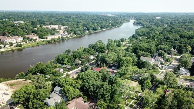 128 Howard Street Geneva, IL 60134 - Photo 28 of 29 an aerial view of residential houses with outdoor space and lake view