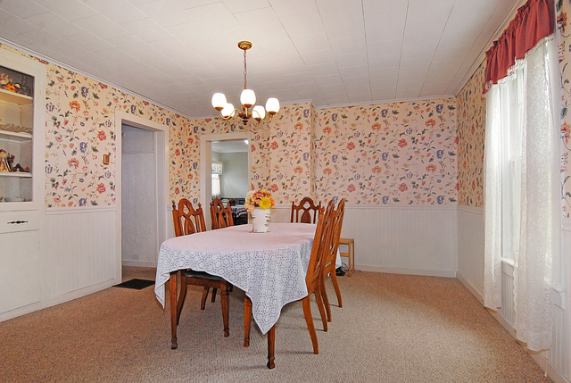 128 Howard Street Geneva, IL 60134 - Photo 8 of 29 a view of a dining room with furniture and chandelier