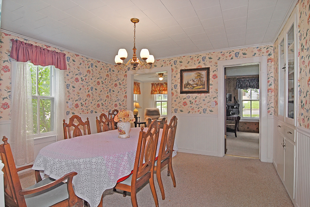 128 Howard Street Geneva, IL 60134 - Photo 9 of 29 a view of a dining room with furniture window and outside view