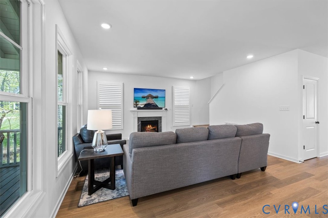 17131 Westington Road Moseley, VA 23120 - Photo 16 of 34 a living room with furniture and a window