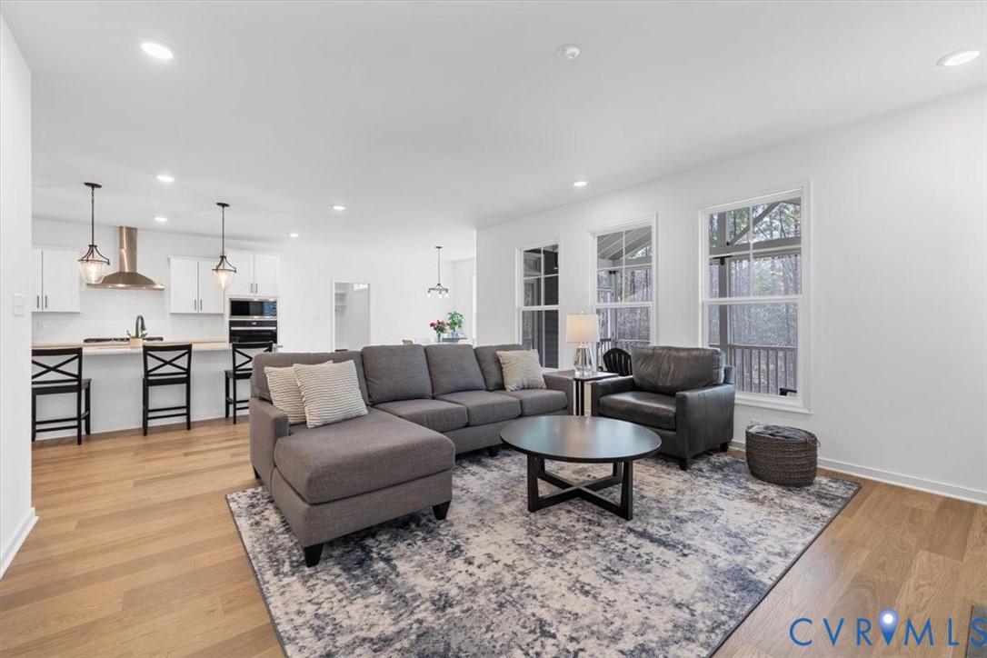17131 Westington Road Moseley, VA 23120 - Photo 17 of 34 a living room with furniture and a rug
