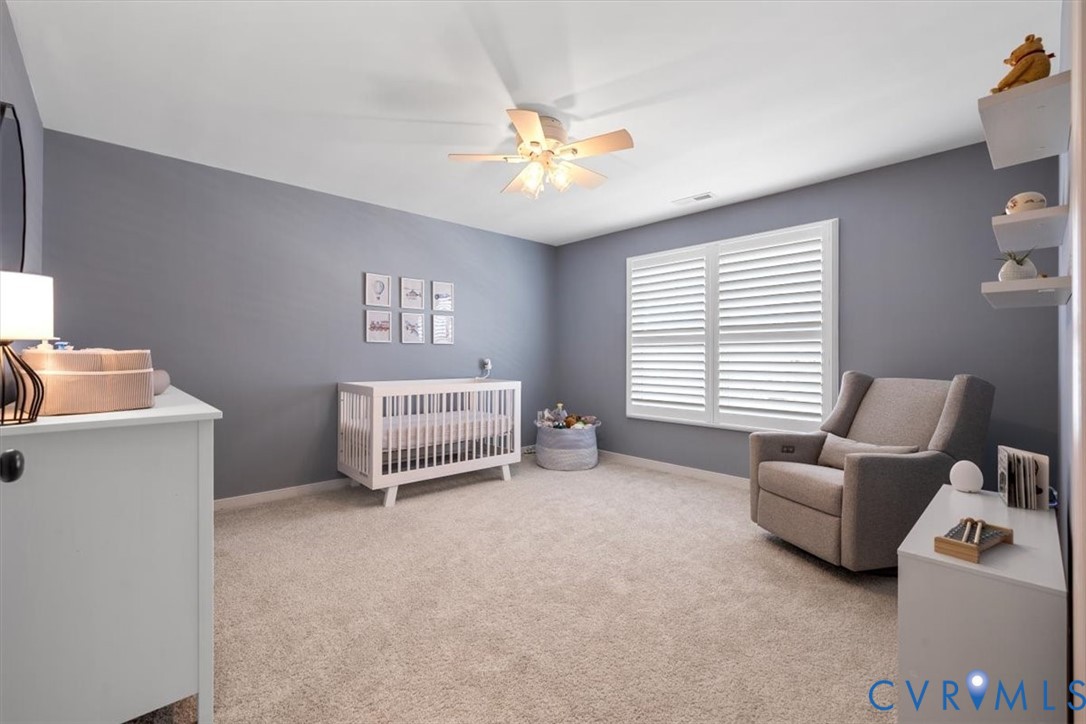 17131 Westington Road Moseley, VA 23120 - Photo 24 of 34 a living room with furniture and a window