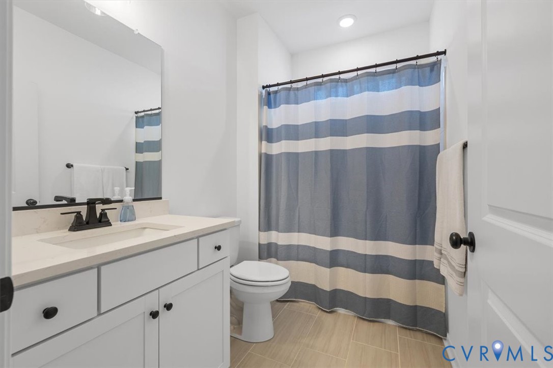 17131 Westington Road Moseley, VA 23120 - Photo 28 of 34 a bathroom with a sink and a mirror