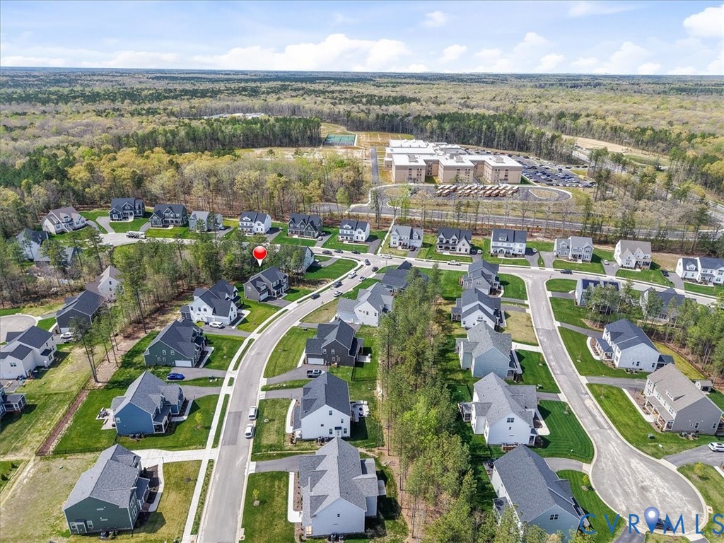 17131 Westington Road Moseley, VA 23120 - Photo 32 of 34 a view of a city with lots of residential buildings ocean and mountain view in back