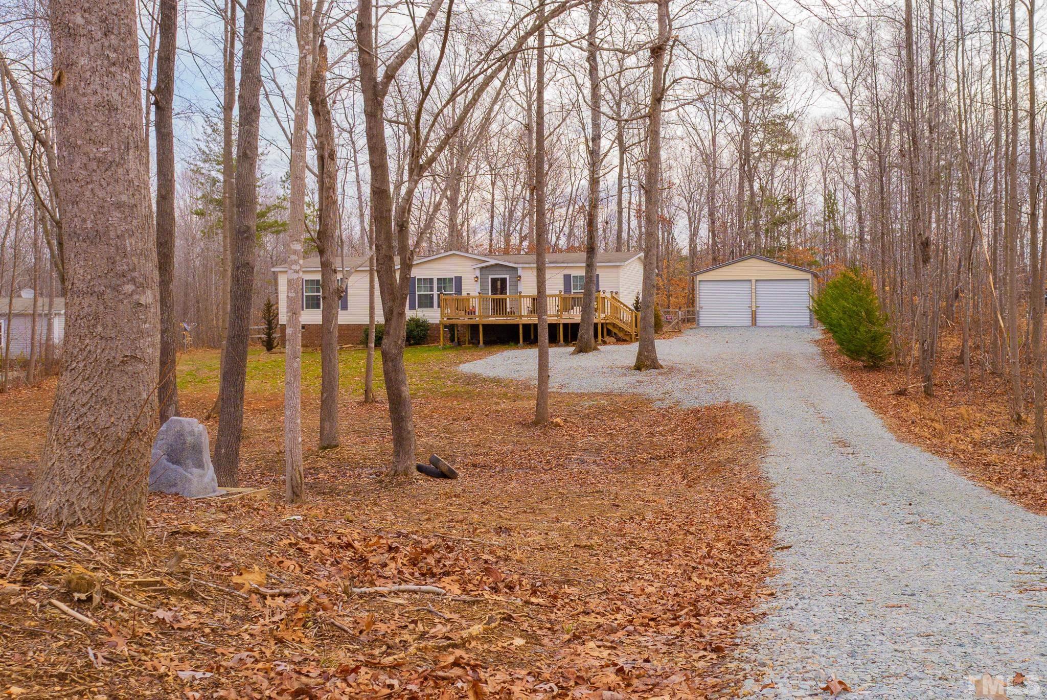 100 Marco Road Roxboro, NC 27574 - Photo 14 of 47 a view of a park with slide