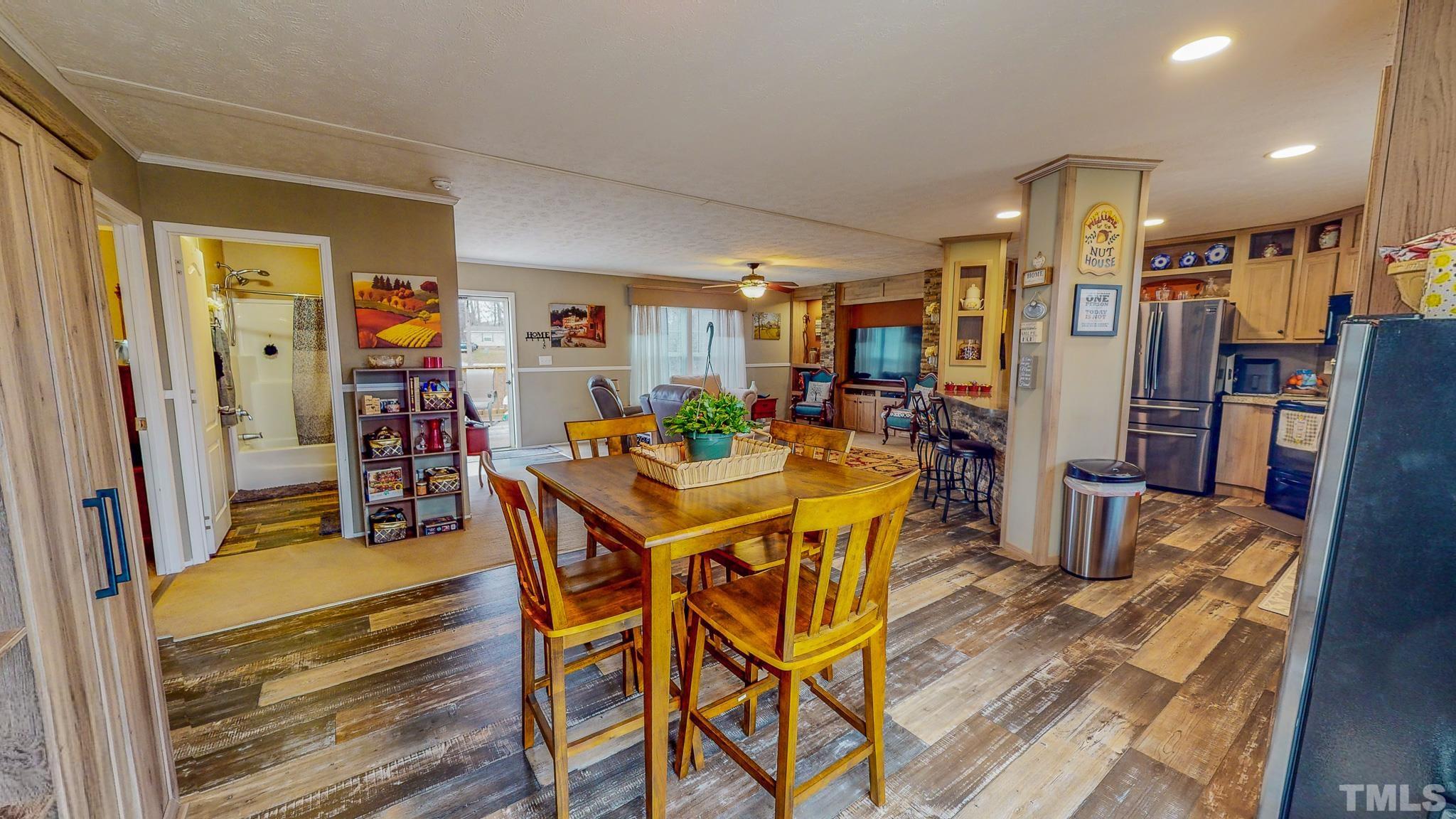 100 Marco Road Roxboro, NC 27574 - Photo 29 of 47 a view of a dining room with furniture