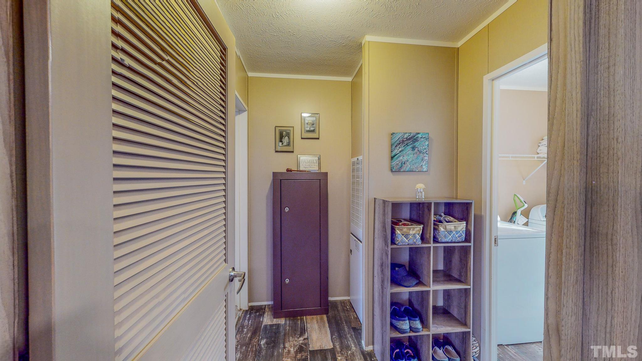 100 Marco Road Roxboro, NC 27574 - Photo 32 of 47 a view of a hallway with shelves