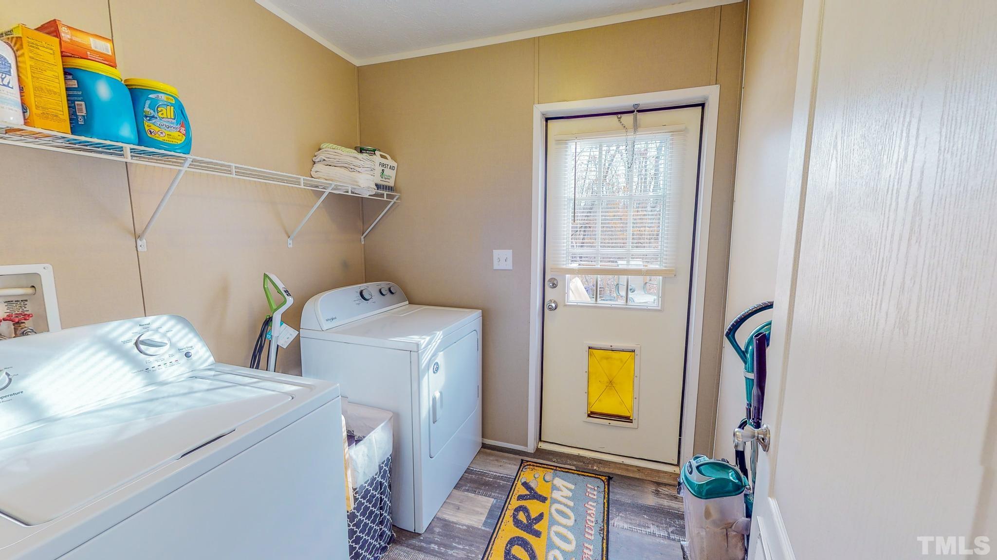 100 Marco Road Roxboro, NC 27574 - Photo 33 of 47 a utility room with dryer and washer