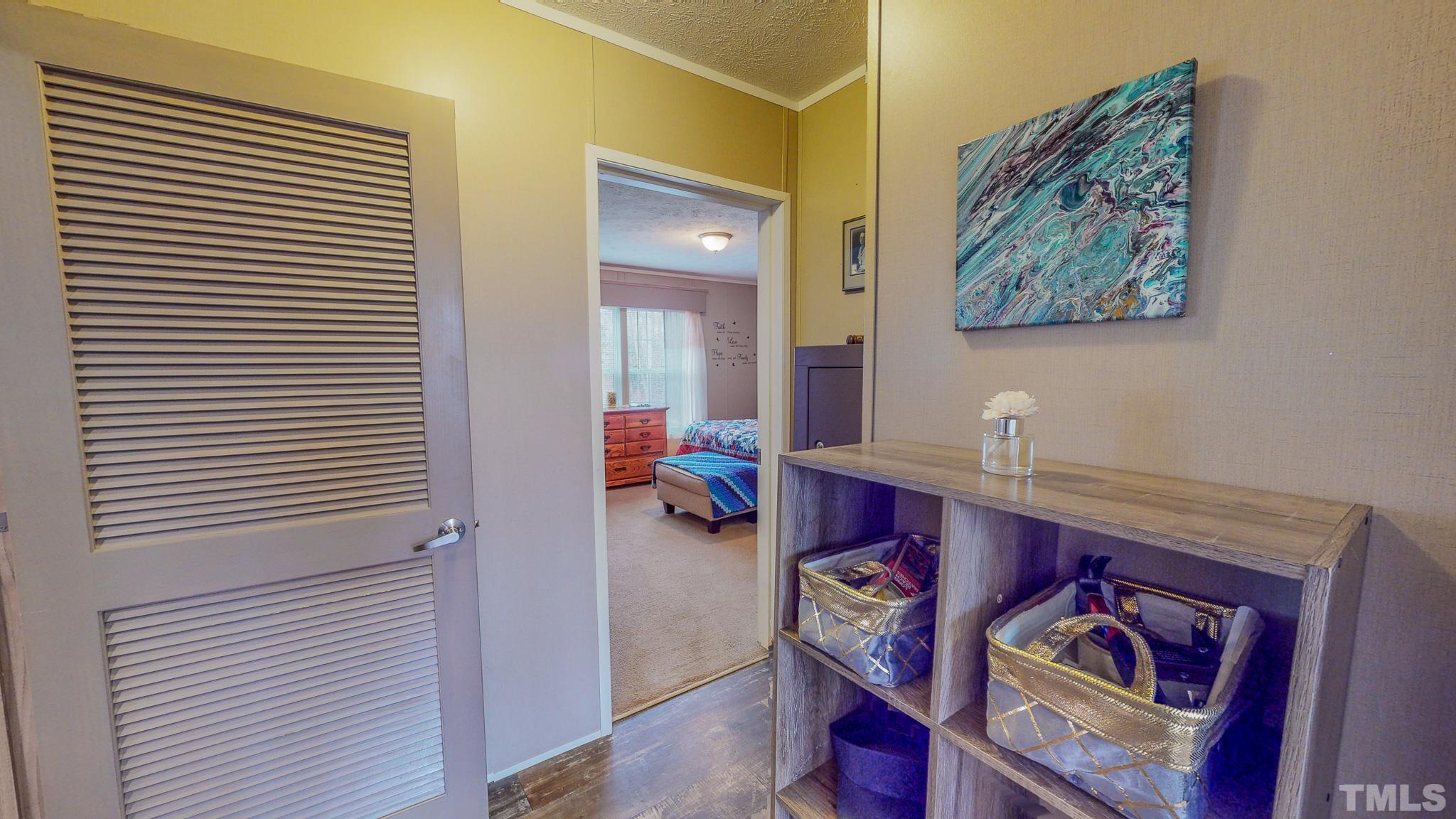 100 Marco Road Roxboro, NC 27574 - Photo 34 of 47 a view of a hallway with workspace and a window