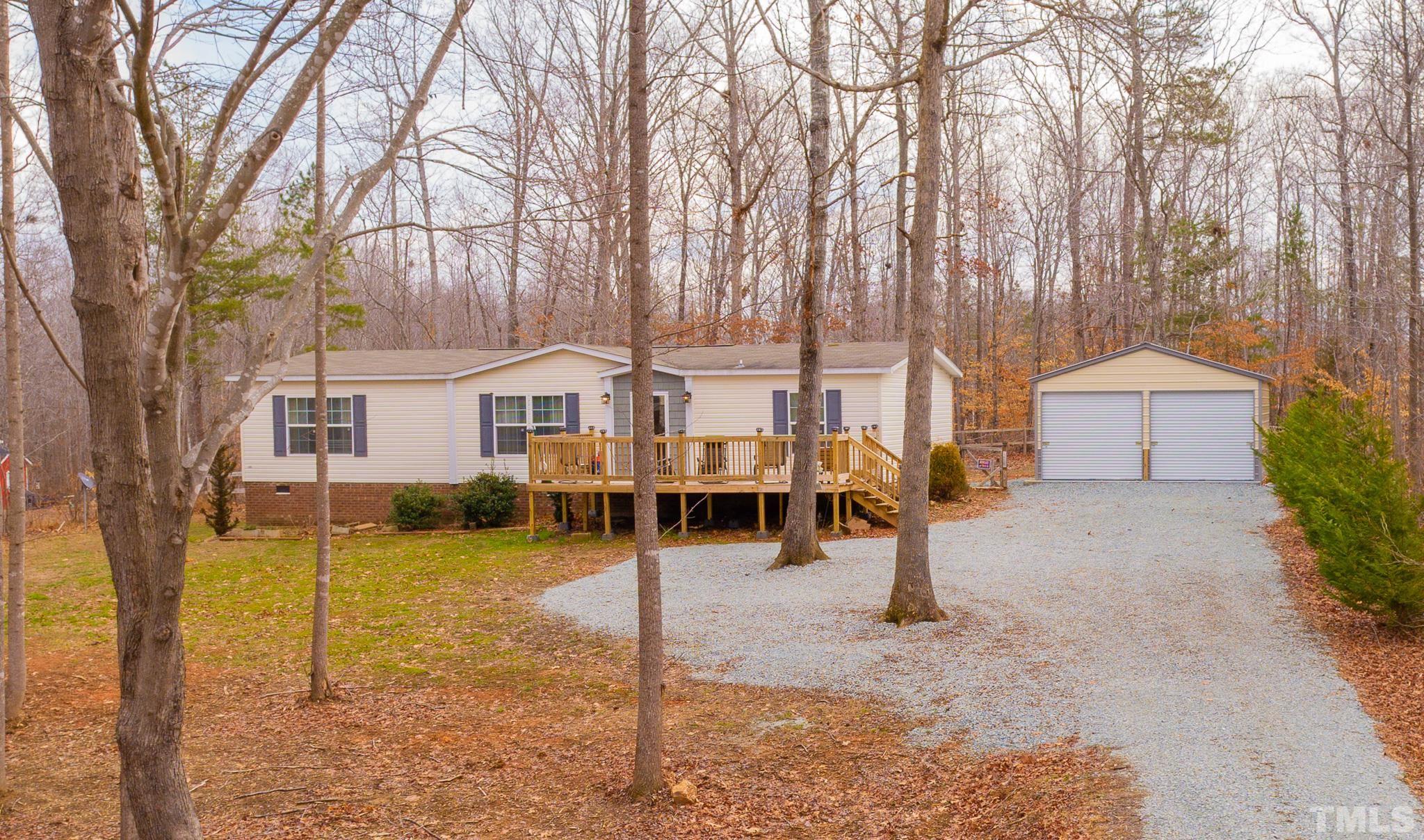 100 Marco Road Roxboro, NC 27574 - Photo 39 of 47 a front view of a house with a yard