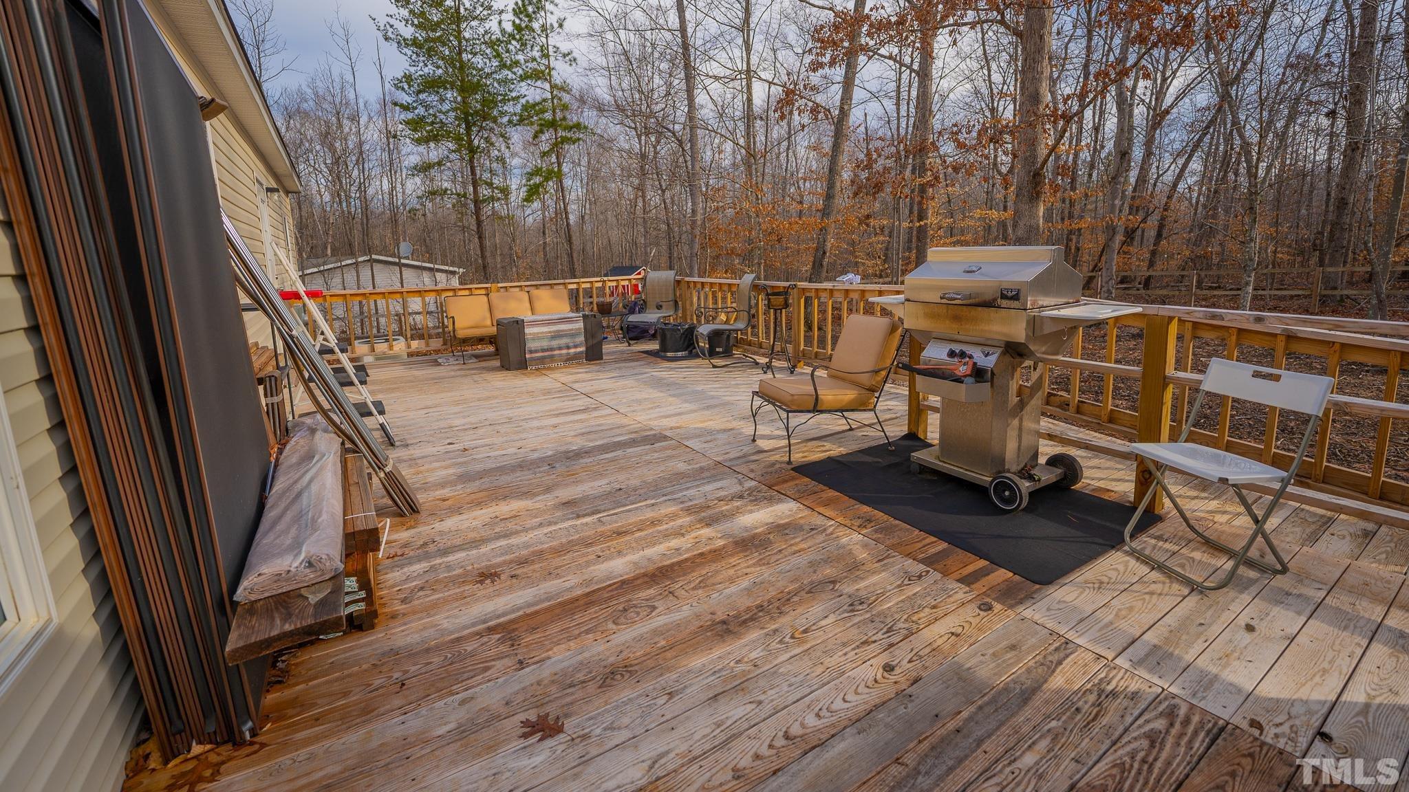 100 Marco Road Roxboro, NC 27574 - Photo 7 of 47 a view of outdoor space with seating area