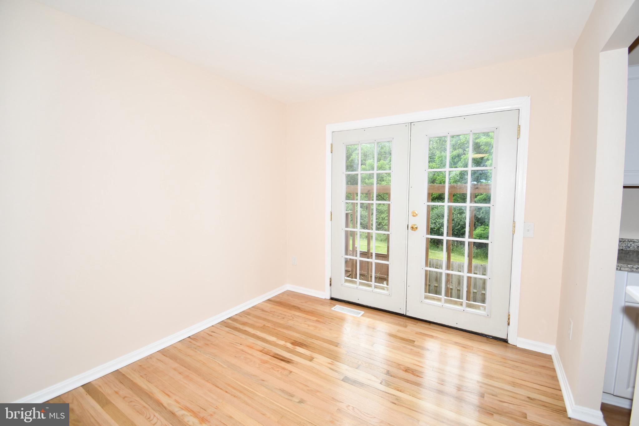 1666 Colonial Way Frederick, MD 21702 - Photo 15 of 62 Bright and airy room with French doors.