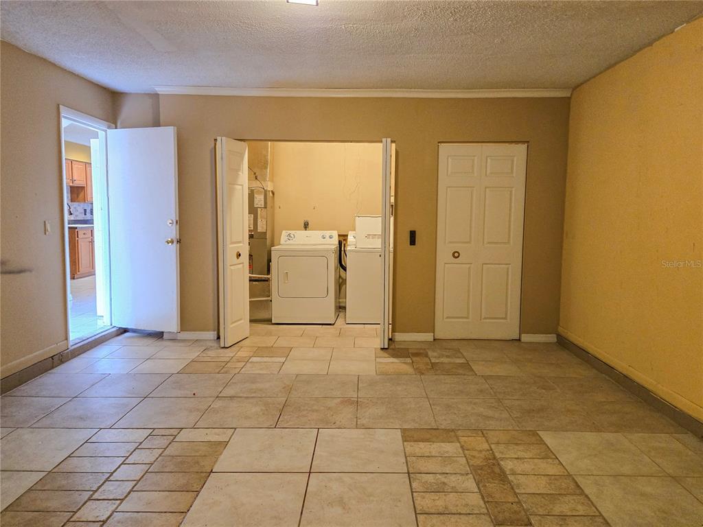 19 Spring Dr Place Ocala, FL 34472 - Photo 28 of 29 a view of a livingroom with an empty space and a window