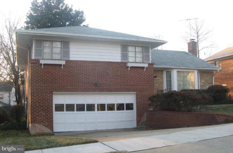 2007 Cascade Road Silver Spring, MD 20902 - Photo 1 of 12 a front view of a house with a yard