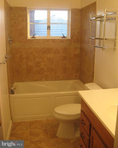 2007 Cascade Road Silver Spring, MD 20902 - Photo 9 of 12 a bathroom with a toilet and a shower