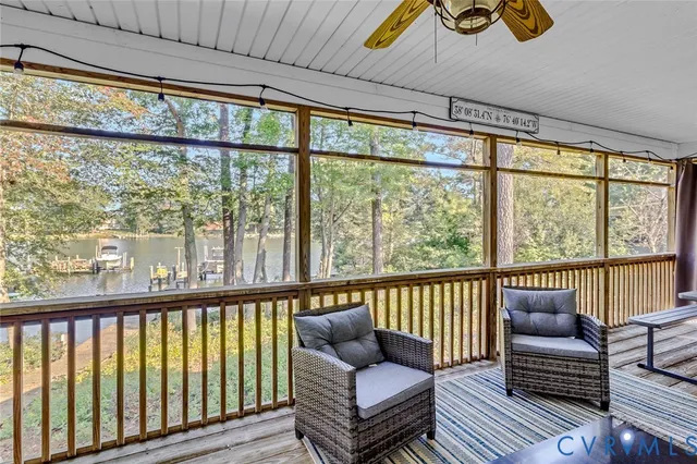 a view of a living room and wooden floor