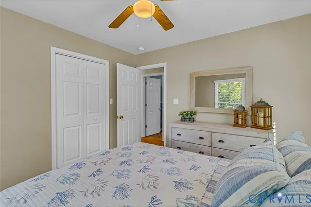 a bathroom with a sink toilet a mirror and shower
