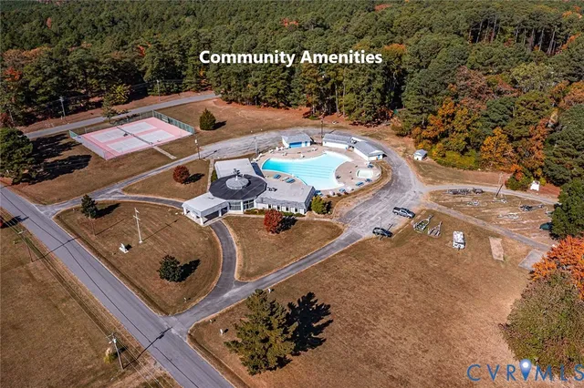 a view of a lake with a building in the background