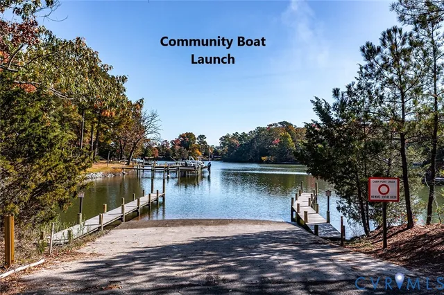 an ocean beach with residential house and ocean view