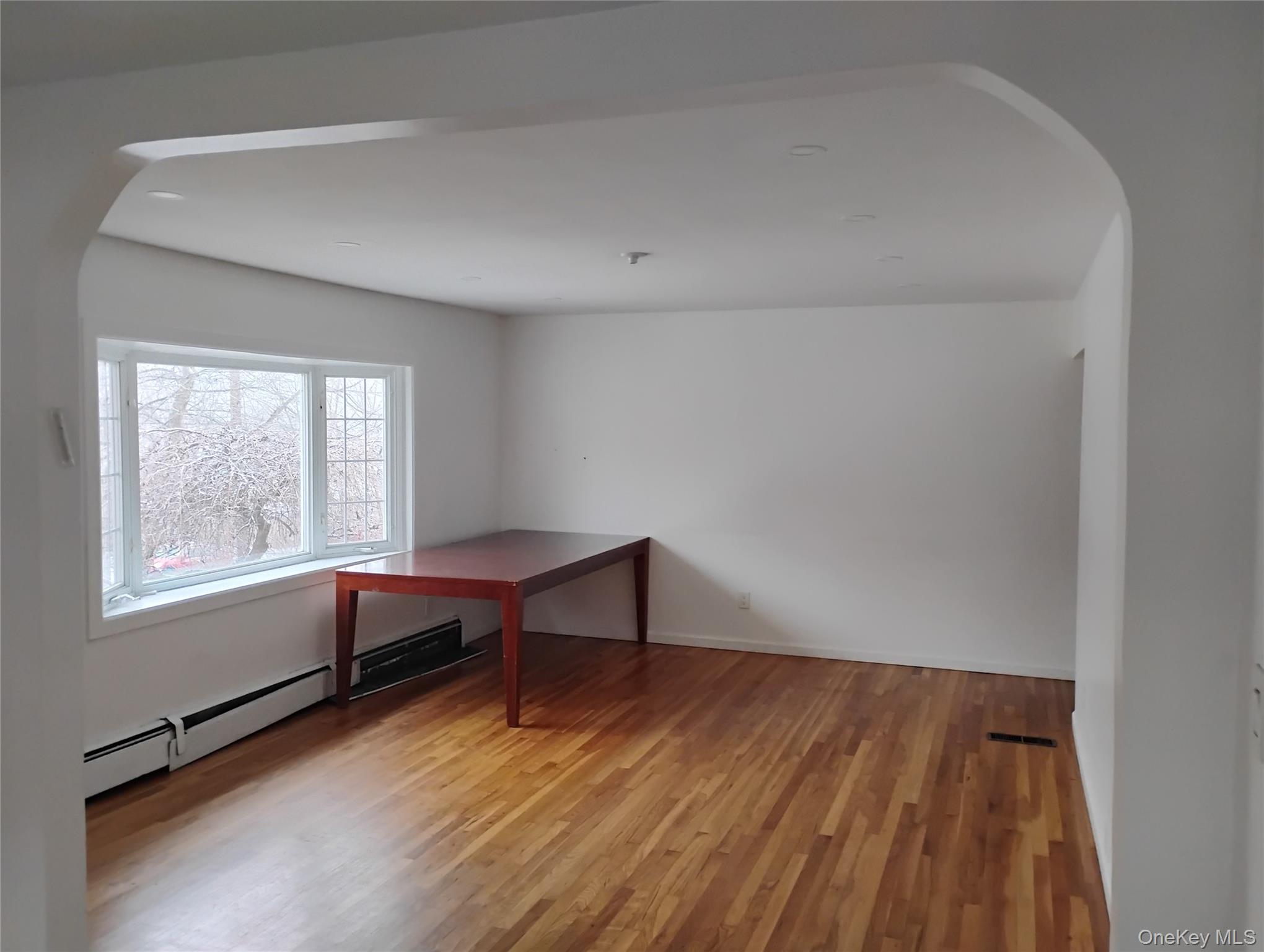 9 Merriewold Lane South Monroe, NY 10950 - Photo 13 of 17 a view of room with window and wooden floor