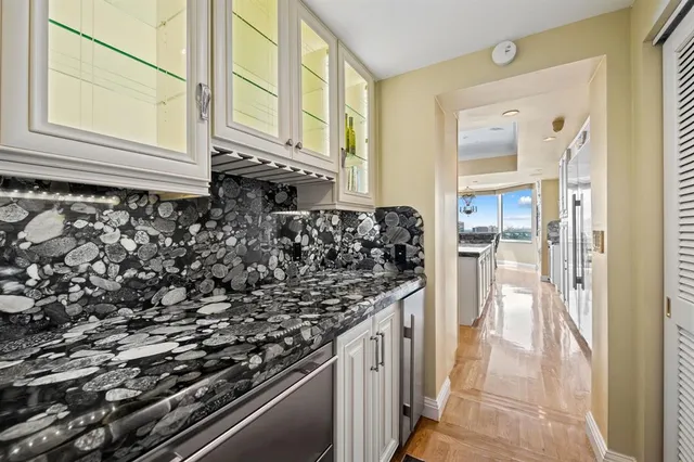 a kitchen with a stove and a window