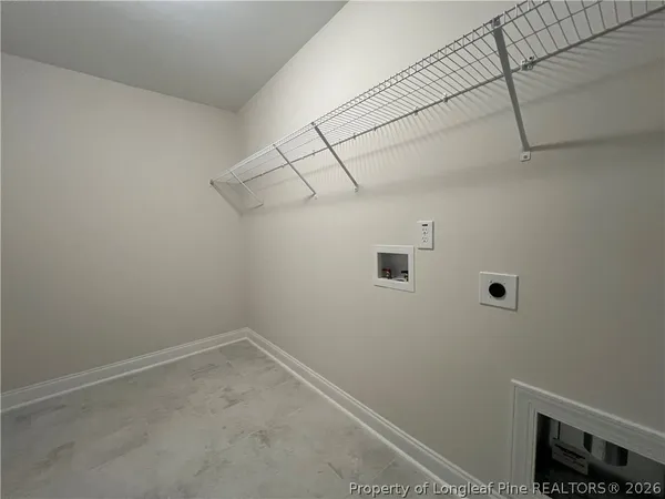 a view of a room with racks on the wall