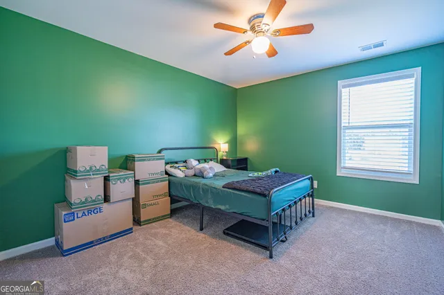 a room with furniture and a window