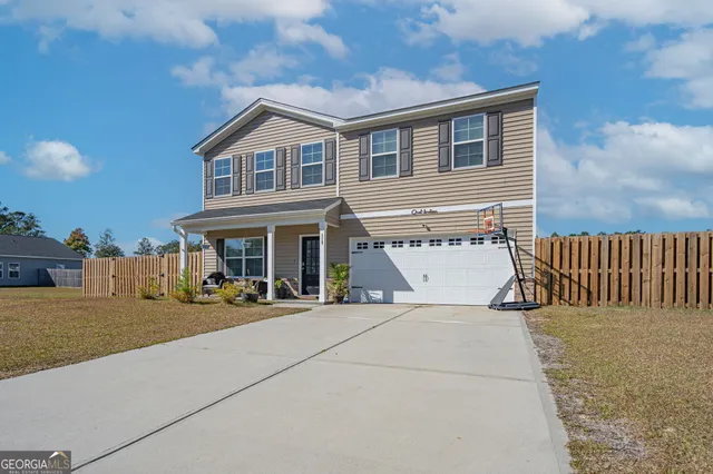 a front view of a house with a patio