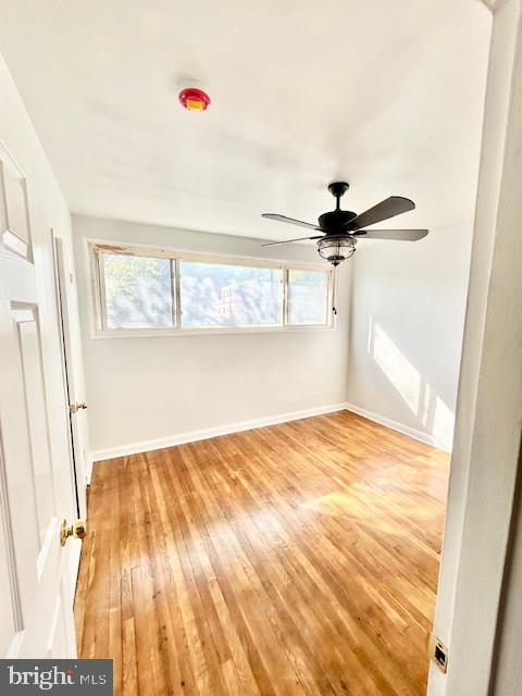 8405 12th Avenue Silver Spring, MD 20903 - Photo 12 of 23 Bright and airy Main bedroom with hardwood floors.