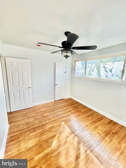 8405 12th Avenue Silver Spring, MD 20903 - Photo 13 of 23 Bright and airy Main bedroom with hardwood floors.