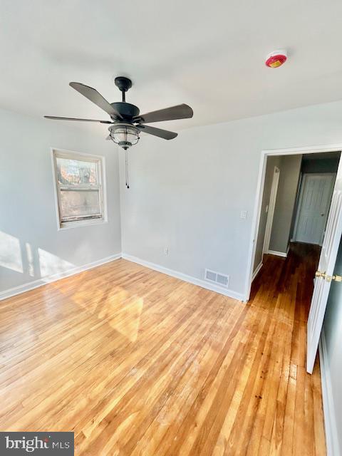 8405 12th Avenue Silver Spring, MD 20903 - Photo 14 of 23 Bright and airy Main bedroom with hardwood floors.