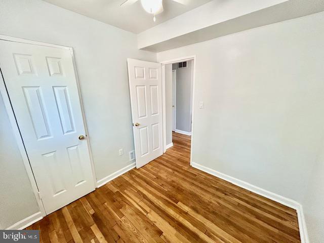8405 12th Avenue Silver Spring, MD 20903 - Photo 17 of 23 Bright and airy bedroom with hardwood floors.