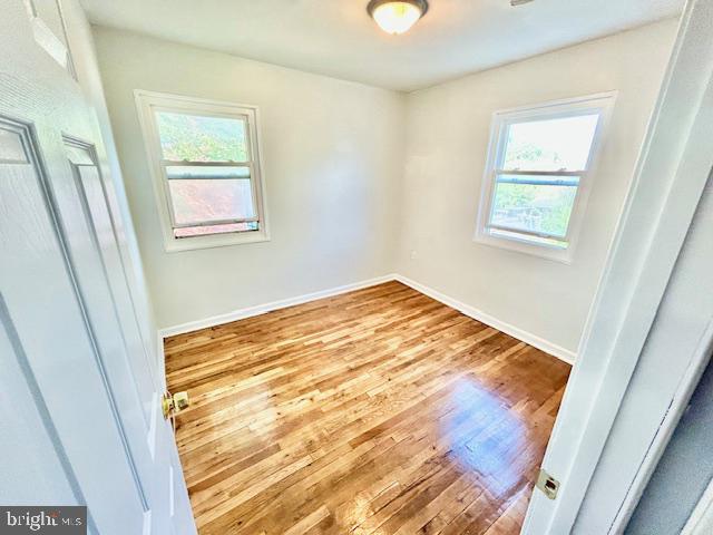 8405 12th Avenue Silver Spring, MD 20903 - Photo 18 of 23 Bright fourth bedroom with hardwood floors.