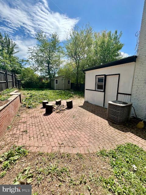 8405 12th Avenue Silver Spring, MD 20903 - Photo 22 of 23 Sunny backyard retreat with greenery.