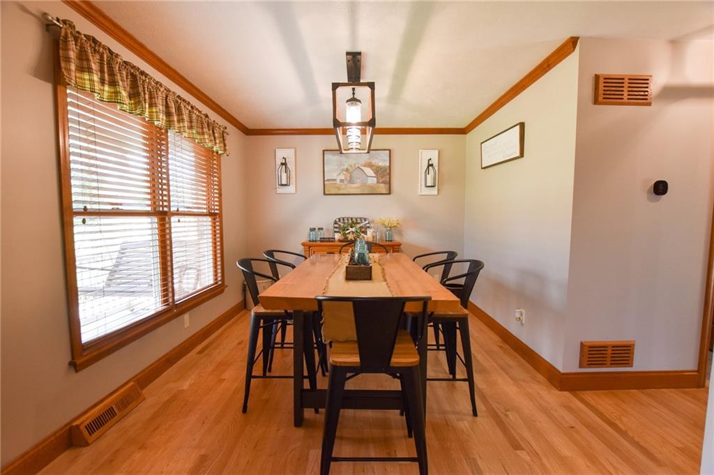 252 Becker Road Butler, PA 16002 - Photo 5 of 23 a view of a dining room with furniture window and wooden floor