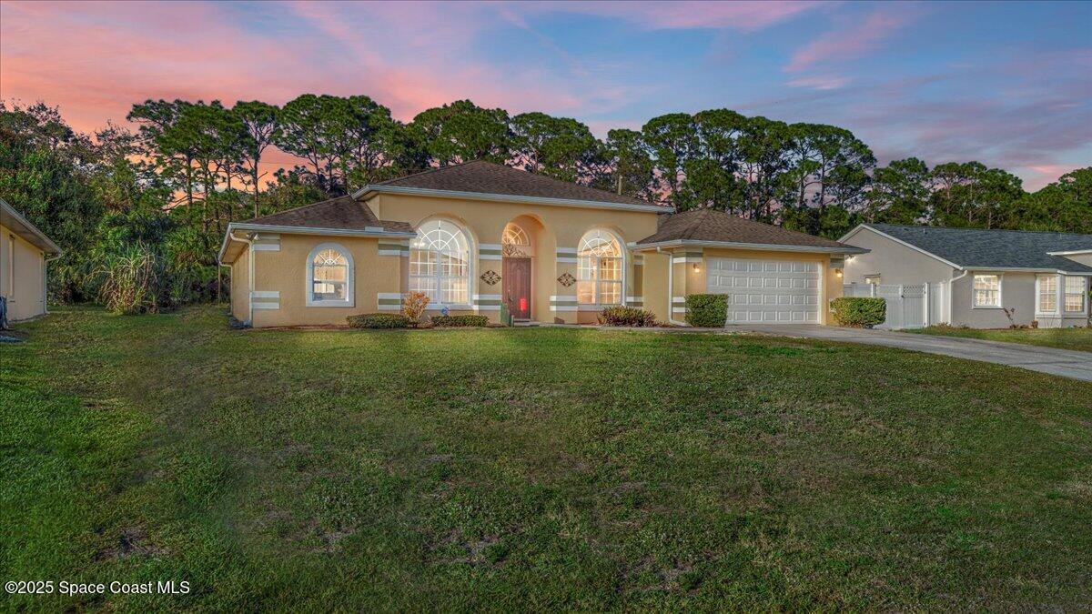 281 Abello Road Southeast Palm Bay, FL 32909 - Photo 1 of 35 01-Twilight