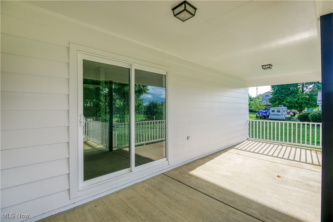 4761 Waterloo Road Atwater, OH 44201 - Photo 22 of 45 Covered deck with new railing