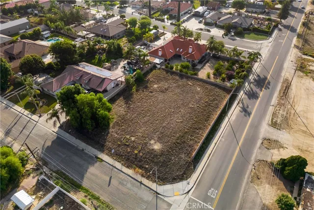 a aerial view of a house with a yard