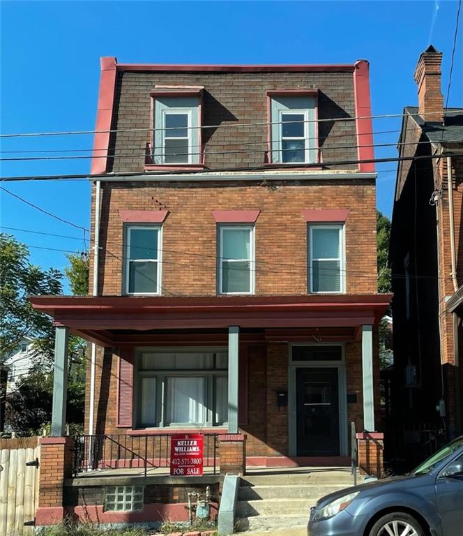 a house view with a outdoor space