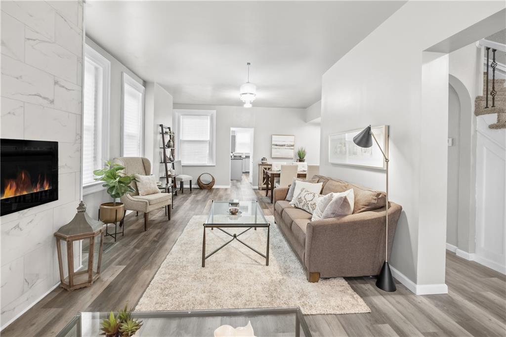 1256 Superior Avenue Pittsburgh, PA 15212 - Photo 12 of 50 a living room with furniture and a fireplace