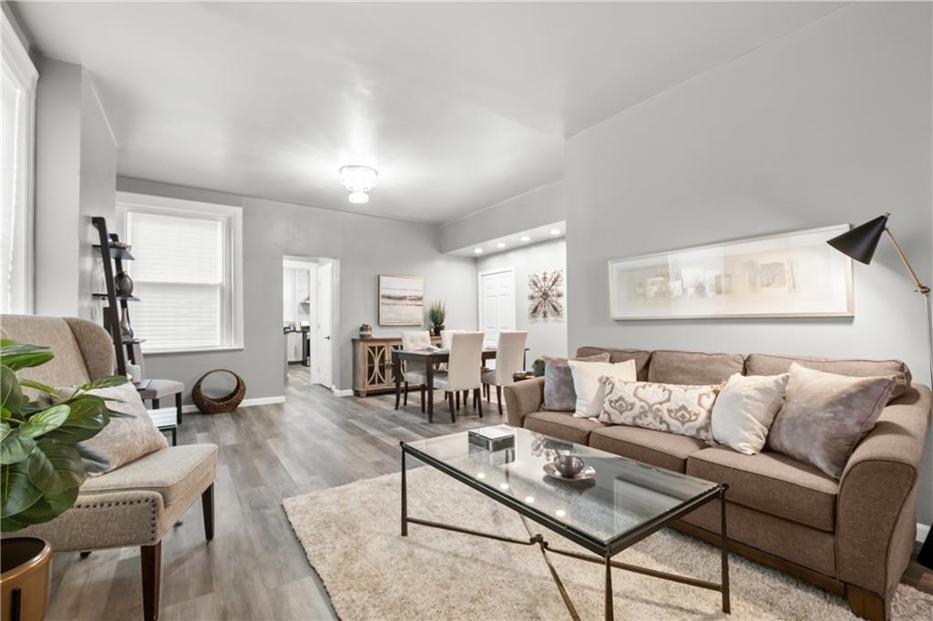 1256 Superior Avenue Pittsburgh, PA 15212 - Photo 14 of 50 a living room with furniture and a large window