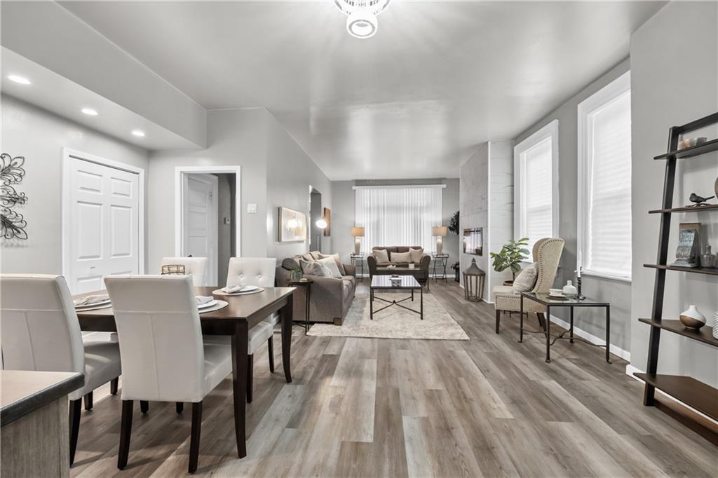1256 Superior Avenue Pittsburgh, PA 15212 - Photo 15 of 50 a view of a dining room with furniture and wooden floor