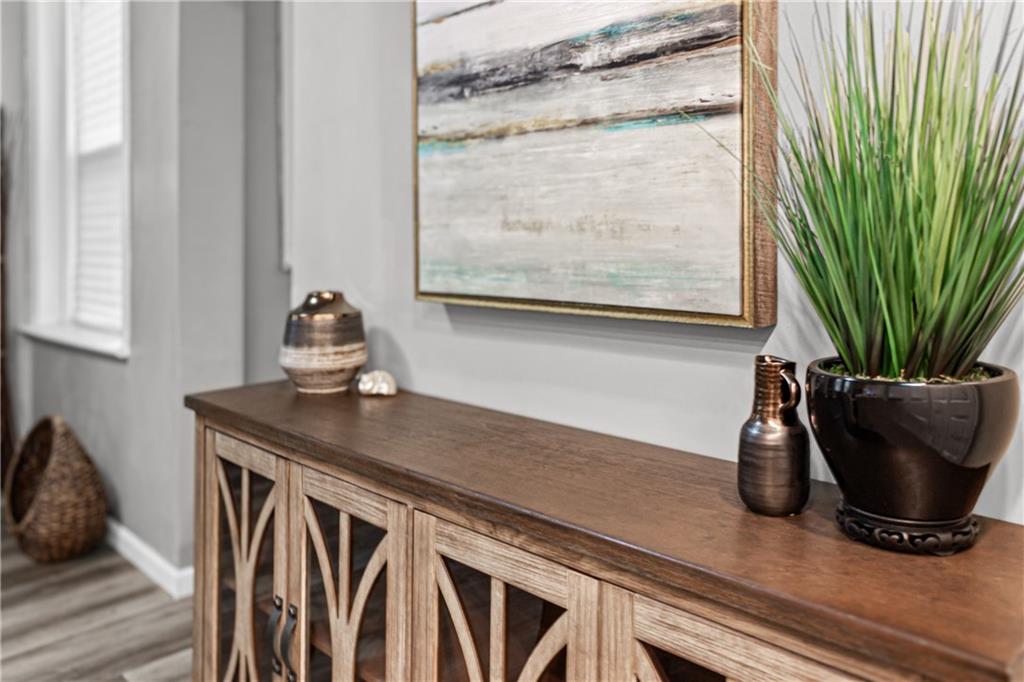 1256 Superior Avenue Pittsburgh, PA 15212 - Photo 18 of 50 a view of dining room with wooden floor and a potted plant