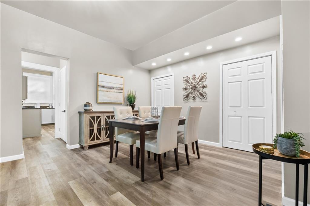 1256 Superior Avenue Pittsburgh, PA 15212 - Photo 19 of 50 a view of a dining room with furniture and wooden floor