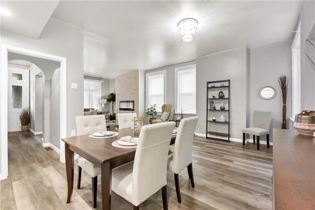 1256 Superior Avenue Pittsburgh, PA 15212 - Photo 20 of 50 a view of a dining room with furniture and wooden floor