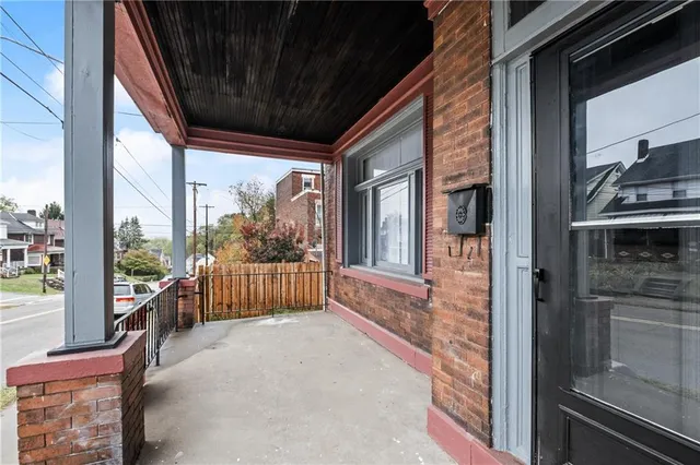a view of a porch with furniture