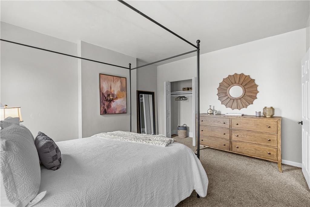 1256 Superior Avenue Pittsburgh, PA 15212 - Photo 38 of 50 a bedroom with a bed and a dresser