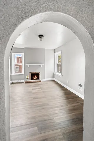 a white toilet sitting next to a bathroom sink